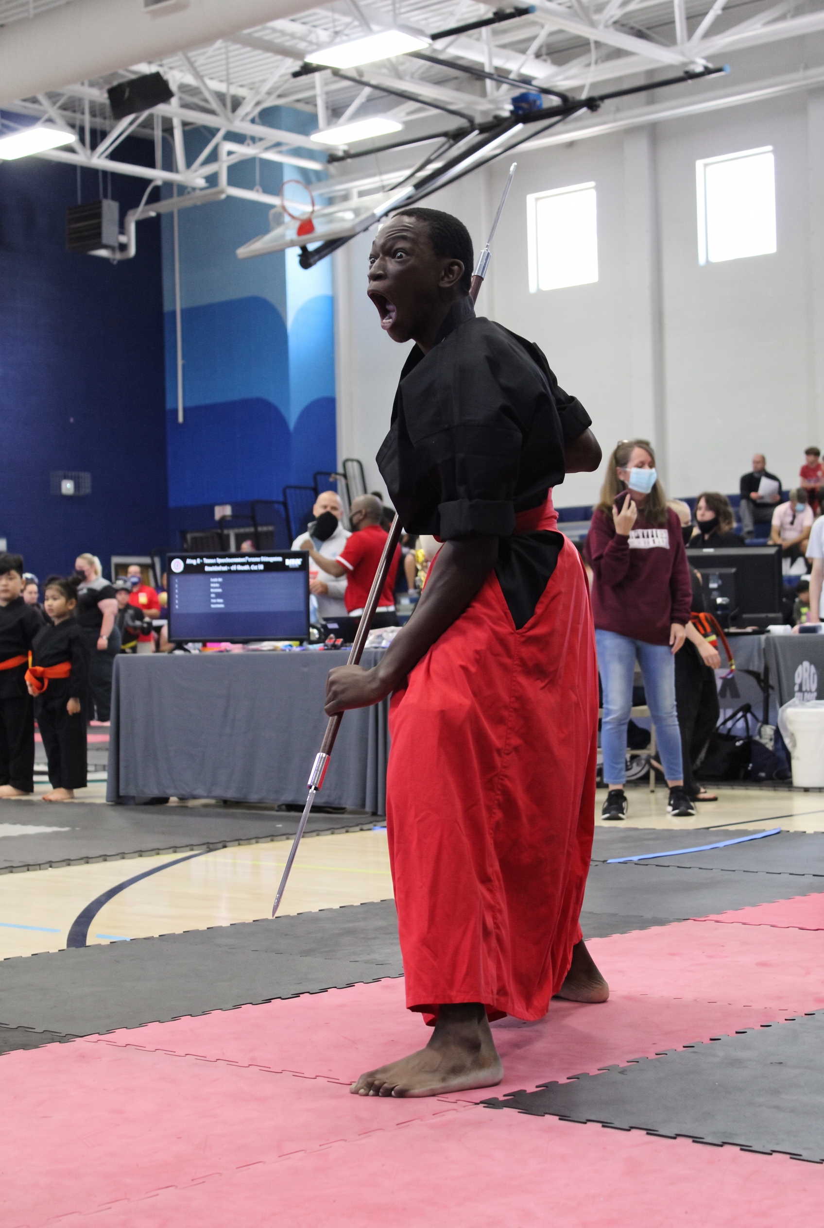 Karate competitor performing at a tournament